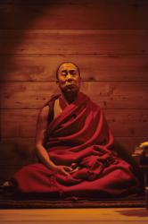 Dalai lama meditating at home